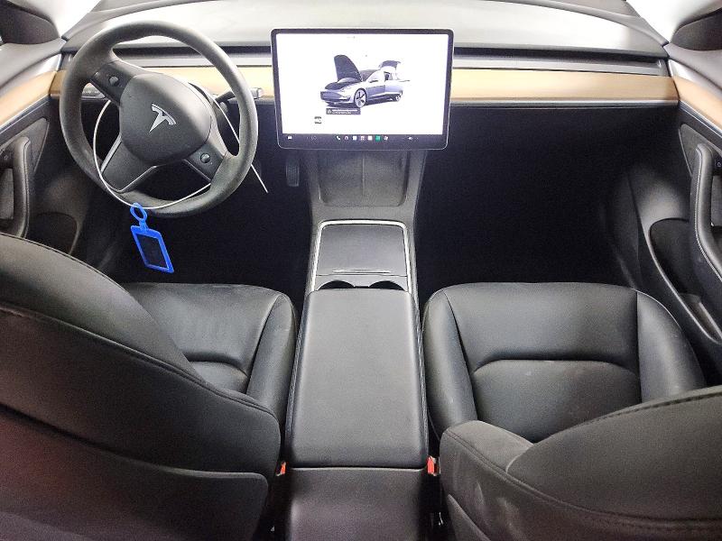 Снимка 8 от търг – 2023 TESLA MODEL 3 с VIN 5YJ3E1EA1PF696868