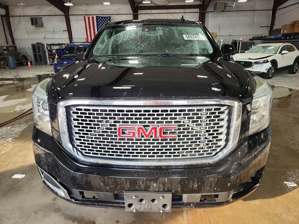 Foto 5 de la subasta – 2016 GMC YUKON con VIN 1GKS2CKJ0GR453166