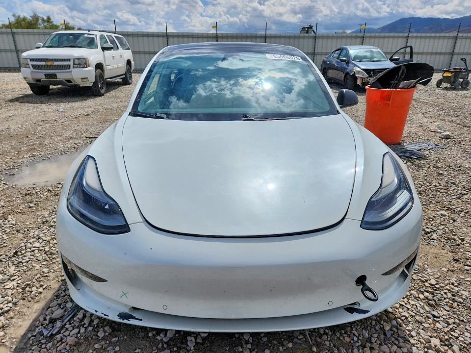 Снимка 5 от търг – 2021 TESLA MODEL 3 с VIN 5YJ3E1EB7MF868969