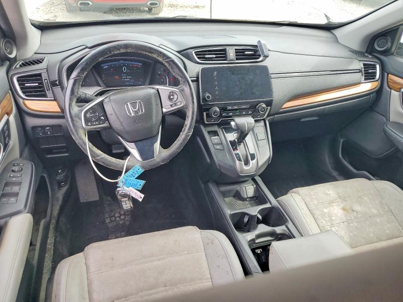 Photo 8 from auction – 2018 HONDA CR-V with VIN 7FARW2H98JE019939