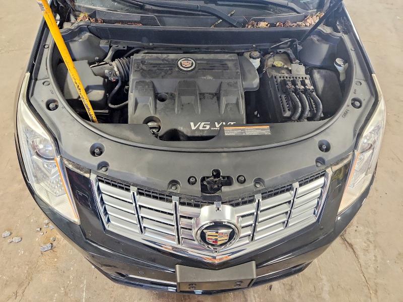 Снимка 12 от търг – 2014 CADILLAC SRX с VIN 3GYFNGE31ES535081