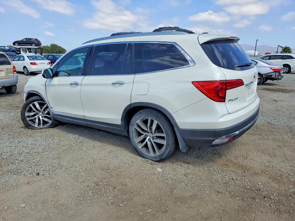 Снимка 2 от търг – 2016 HONDA PILOT с VIN 5FNYF5H99GB017571