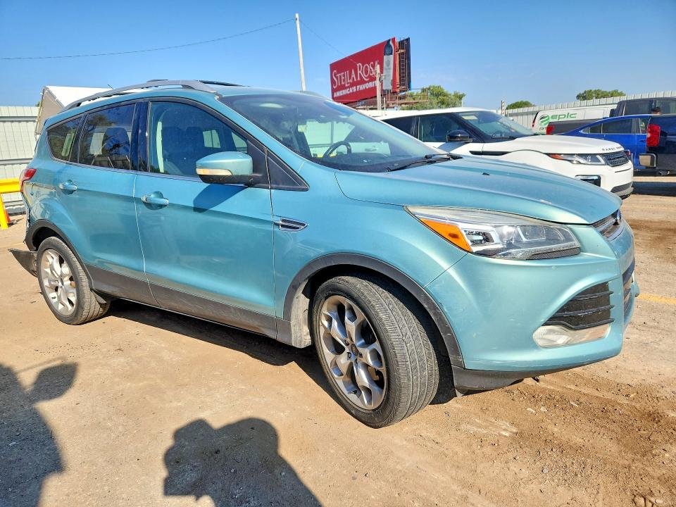 Foto 4 de la subasta – 2013 FORD ESCAPE con VIN 1FMCU9J97DUA01367