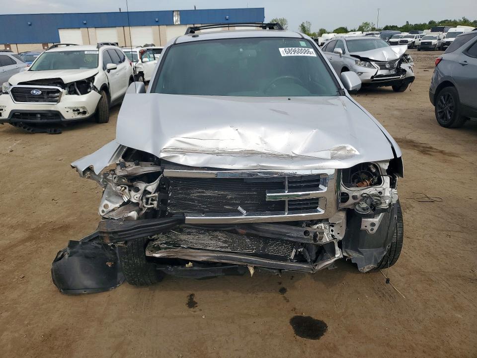 Photo 5 from auction – 2011 FORD ESCAPE with VIN 1FMCU0EG9BKA91005