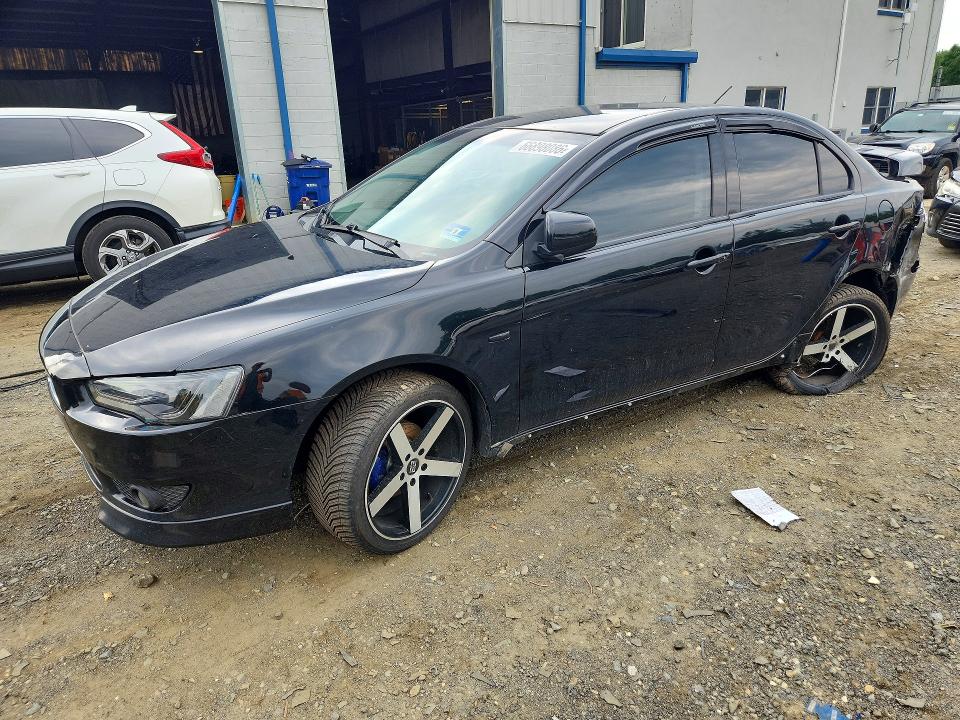 MITSUBISHI LANCER 2014 مع رقم تعريف المركبة JA32V2FW8EU605867 - صورة من المزاد