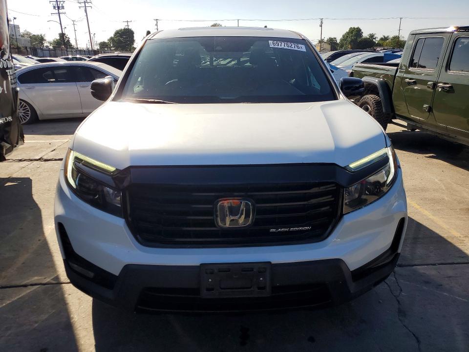 Photo 5 from auction – 2022 HONDA RIDGELINE with VIN 5FPYK3F87NB027045