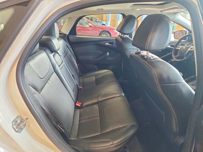 Photo 10 from auction – 2013 FORD FOCUS with VIN 1FADP3J28DL368094
