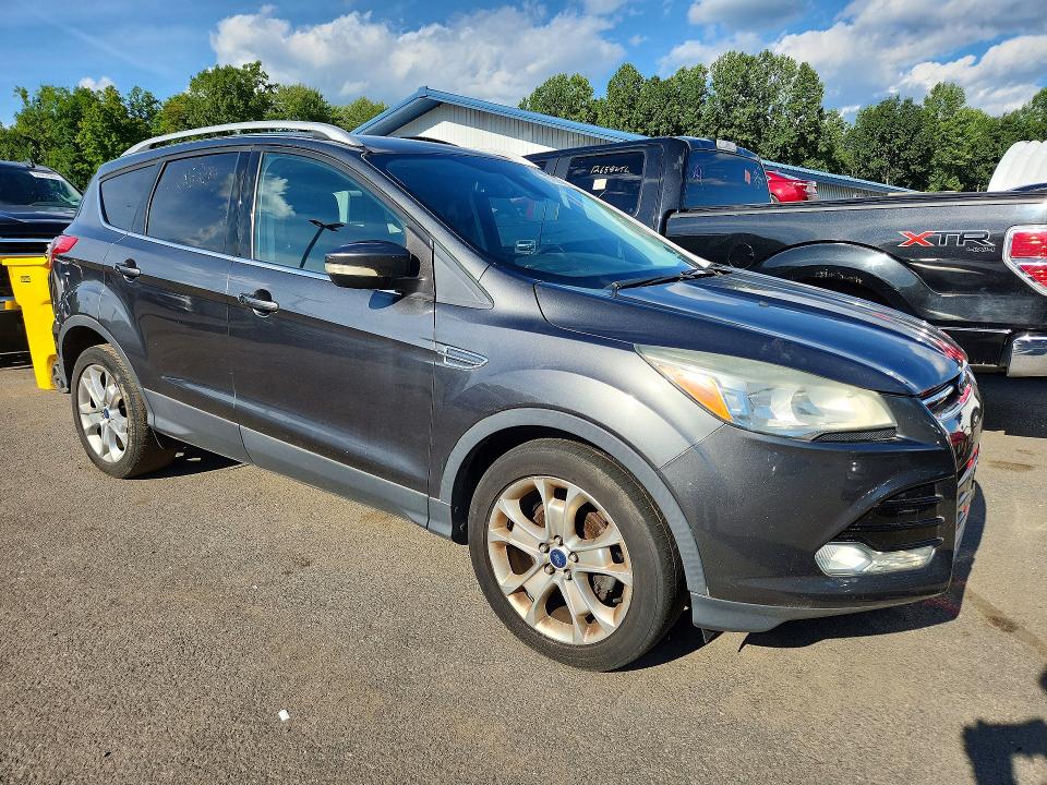 Photo 4 from auction – 2015 FORD ESCAPE with VIN 1FMCU0JX4FUA14817