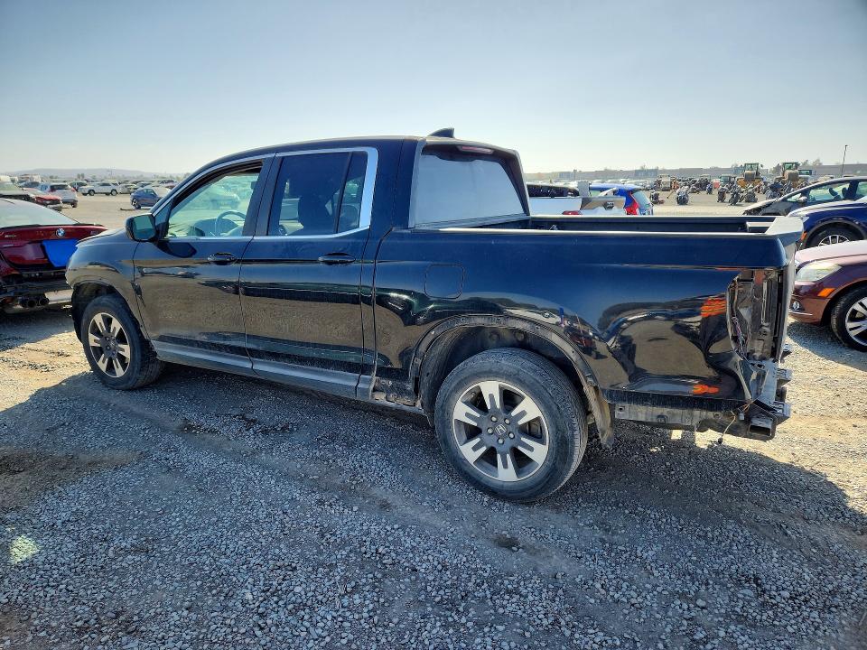Photo 2 from auction – 2017 HONDA RIDGELINE with VIN 5FPYK3F58HB022351