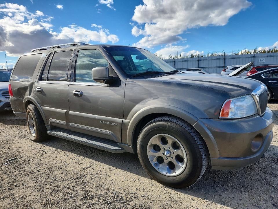 Снимка 4 от търг – 2003 LINCOLN NAVIGATOR с VIN 5LMFU28R63LJ48811