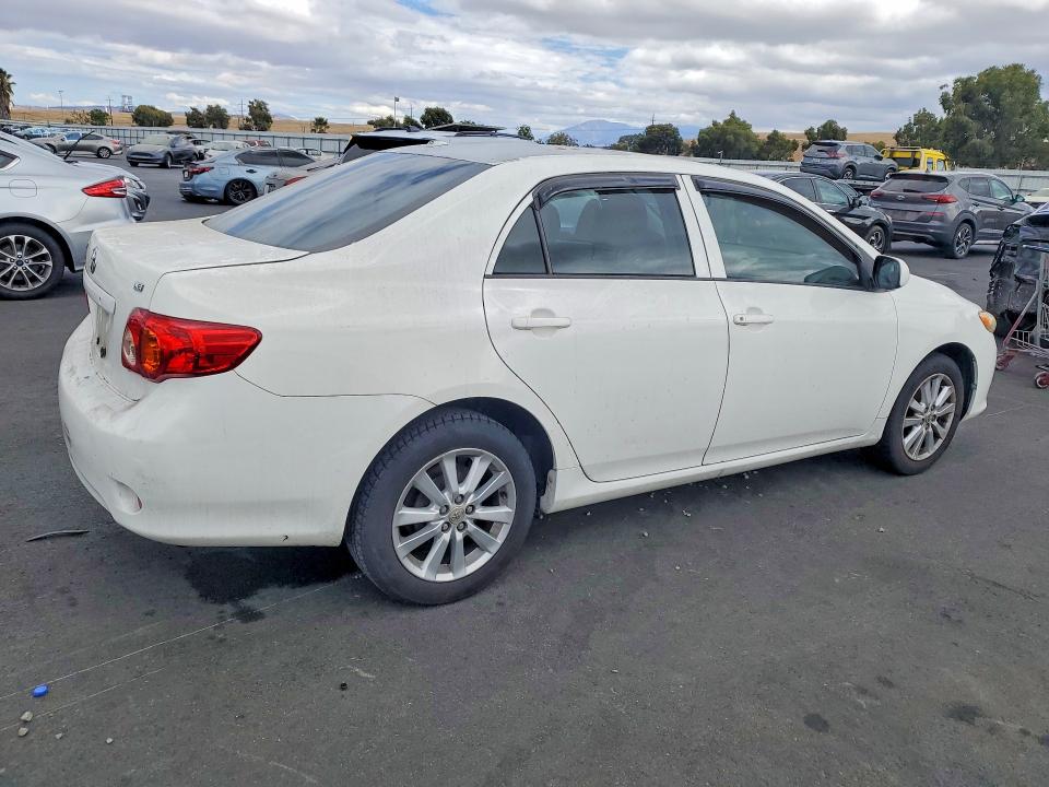 Photo 3 from auction – 2009 TOYOTA COROLLA with VIN JTDBL40E49J024201