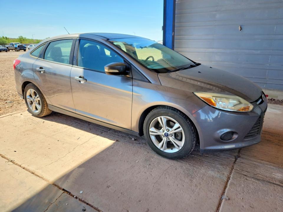 Photo 4 from auction – 2014 FORD FOCUS with VIN 1FADP3F2XEL129592