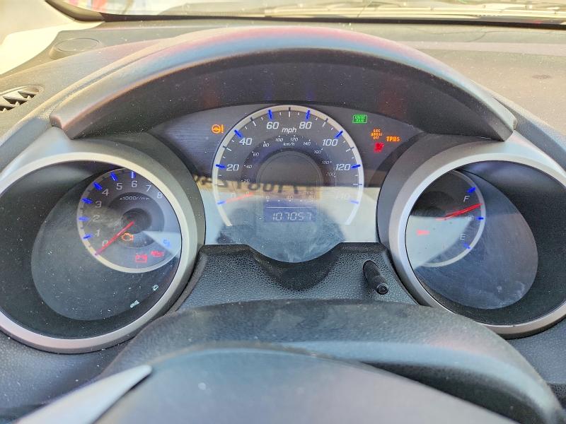 Снимка 9 от търг – 2009 HONDA FIT с VIN JHMGE88429S028629