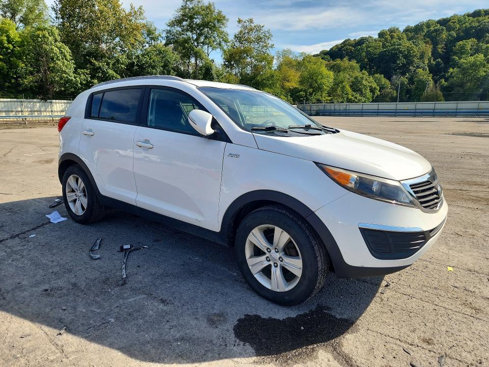 Photo 4 from auction – 2011 KIA SPORTAGE with VIN KNDPBCA29B7163928
