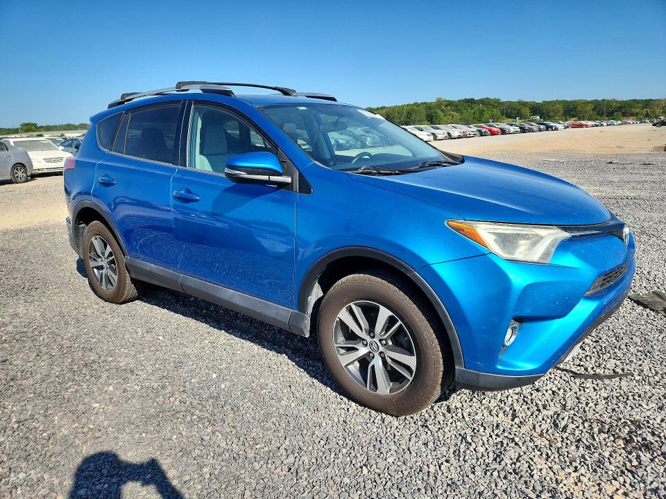 Photo 4 from auction – 2016 TOYOTA RAV4 with VIN 2T3RFREV2GW507986