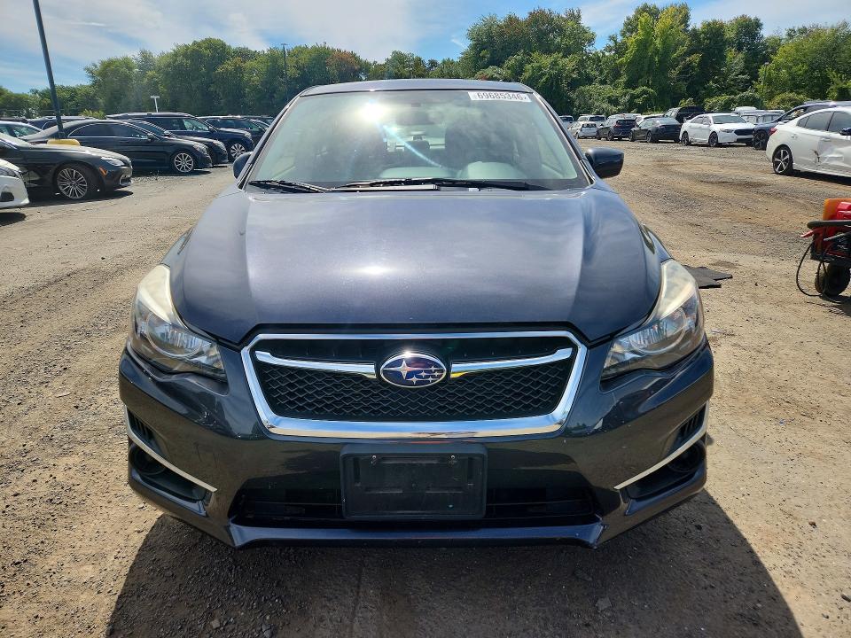 Снимка 5 от търг – 2016 SUBARU IMPREZA с VIN JF1GJAB60GH005803