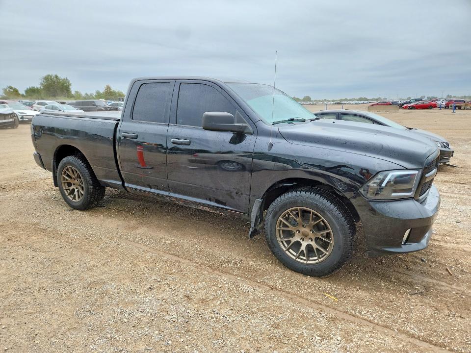 Снимка 4 от търг – 2014 RAM 1500 с VIN 1C6RR7FT7ES300418