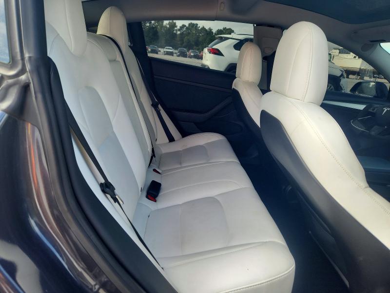 Снимка 10 от търг – 2021 TESLA MODEL 3 с VIN 5YJ3E1EC4MF988477