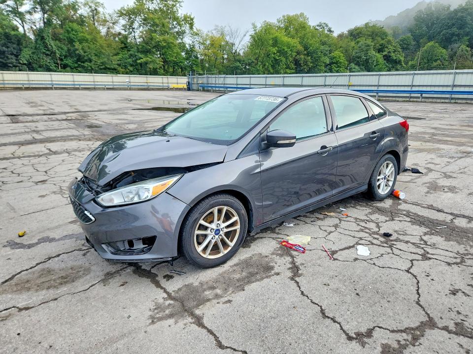 FORD FOCUS 2016 with VIN 1FADP3F22GL211447 - Photo from auction