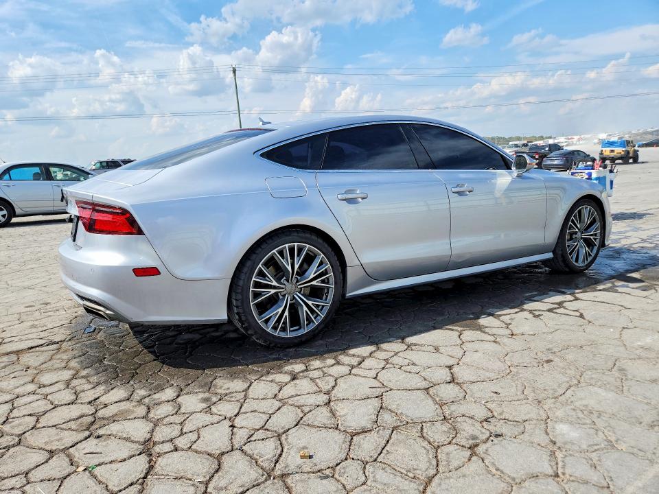 Фото 3 с аукциона – 2016 AUDI A7 с VIN WAUWGAFC6GN005212
