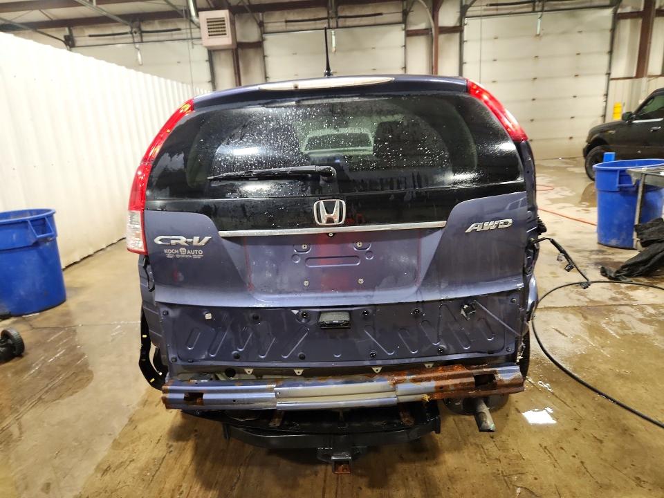 Photo 6 from auction – 2013 HONDA CR-V with VIN 2HKRM4H50DH665590
