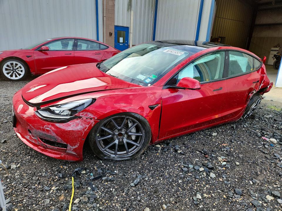 TESLA MODEL 3 2022 with VIN 5YJ3E1EA8NF371518 - Photo from auction