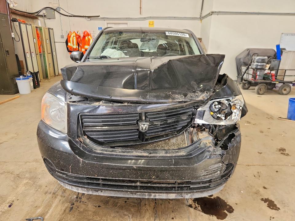 Foto 5 de la subasta – 2009 DODGE CALIBER con VIN 1B3HB28A49D136029