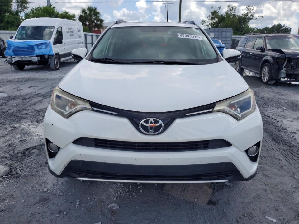 Photo 5 from auction – 2016 TOYOTA RAV4 with VIN JTMWFREVXGD084591