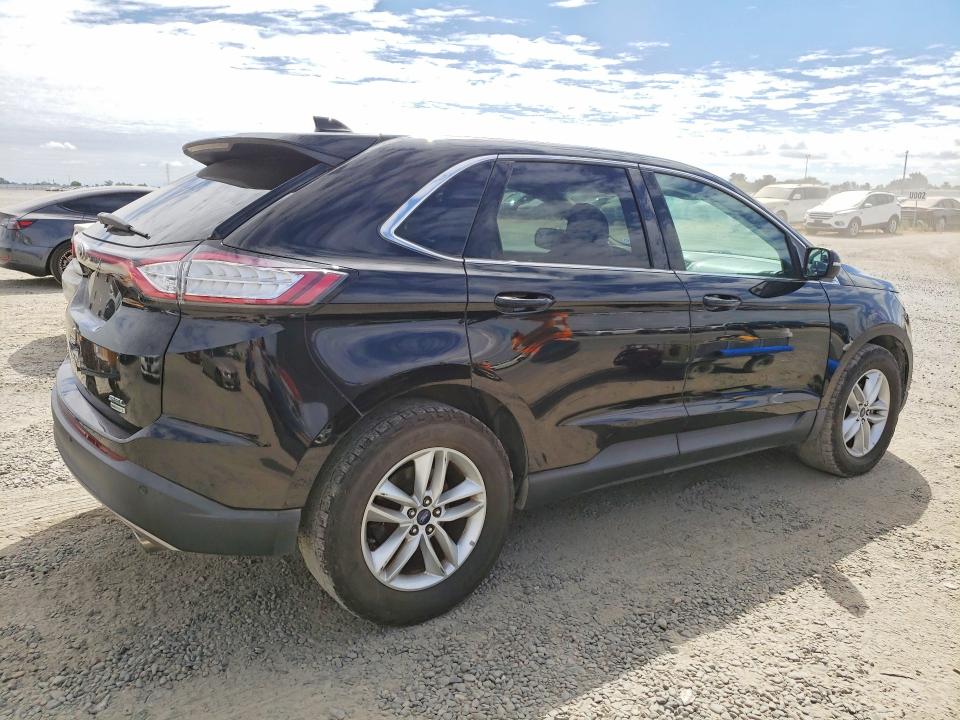 Photo 3 from auction – 2016 FORD EDGE with VIN 2FMPK3J94GBC52975