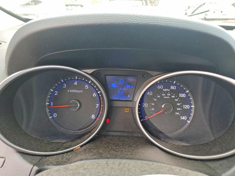 Photo 9 from auction – 2010 HYUNDAI TUCSON with VIN KM8JUCAC3AU024883