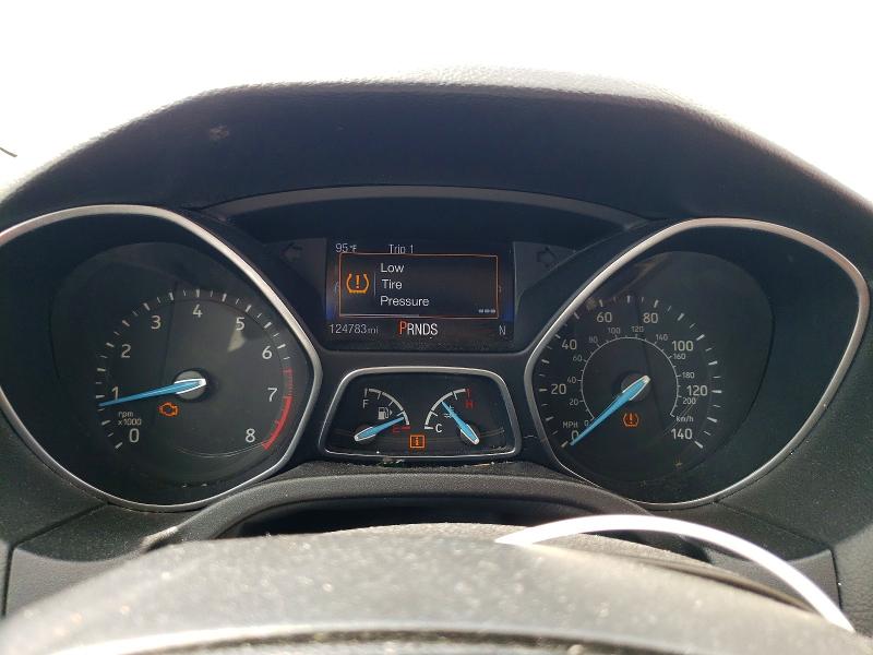 Photo 9 from auction – 2015 FORD FOCUS with VIN 1FADP3F20FL310461