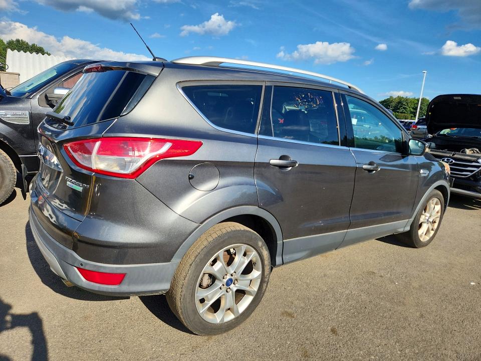 Photo 3 from auction – 2015 FORD ESCAPE with VIN 1FMCU0JX4FUA14817