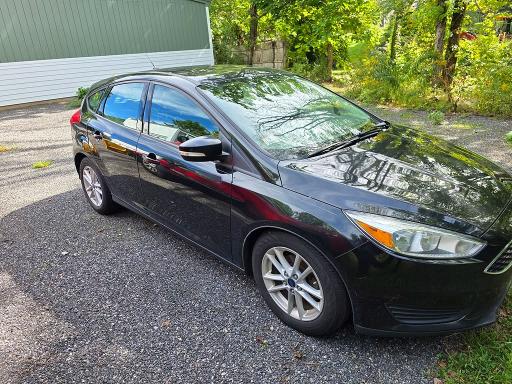 Photo 4 from auction – 2015 FORD FOCUS with VIN 1FADP3KE8FL272767