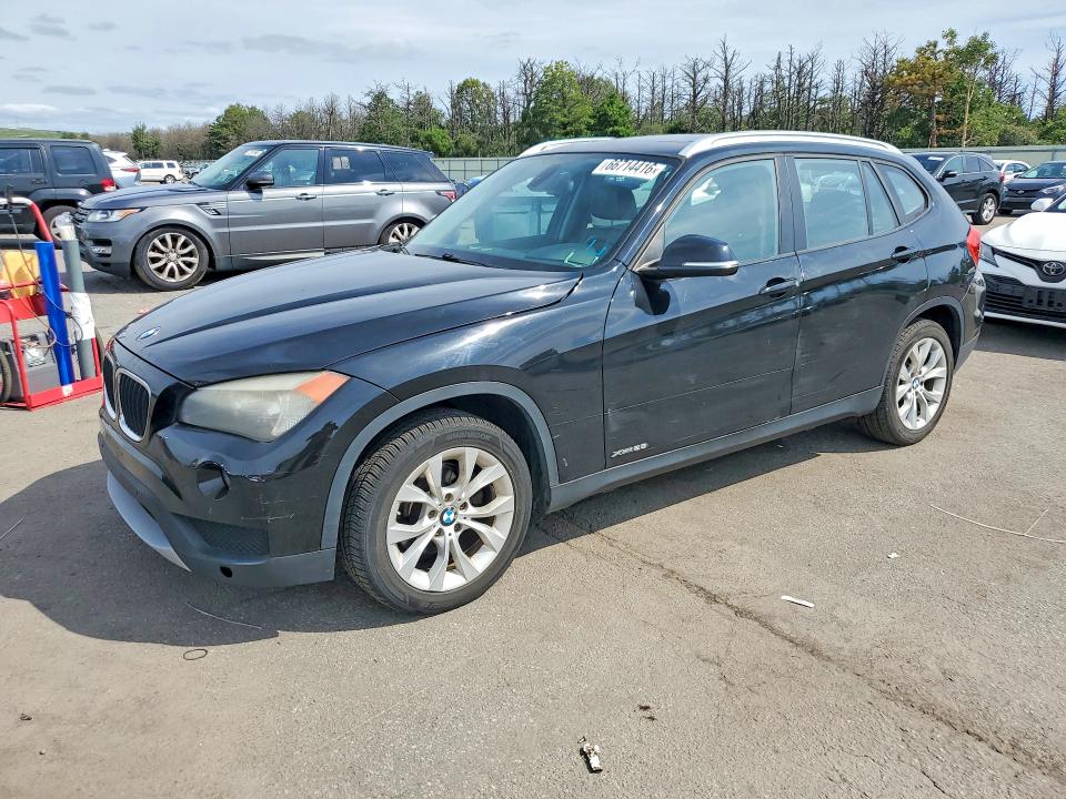 BMW X1 2014 with VIN WBAVL1C56EVY18284 - Photo from auction