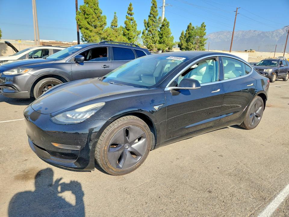 TESLA MODEL 3 2018 with VIN 5YJ3E1EA4JF166305 - Photo from auction