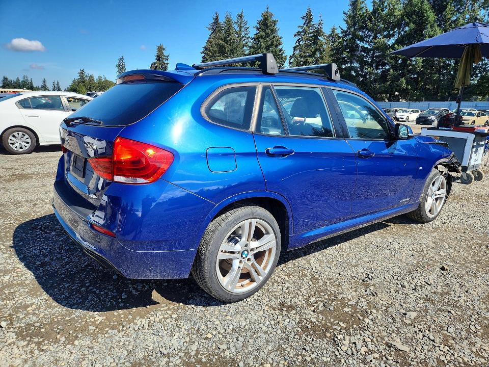Photo 3 from auction – 2014 BMW X1 with VIN WBAVL1C5XEVY15498