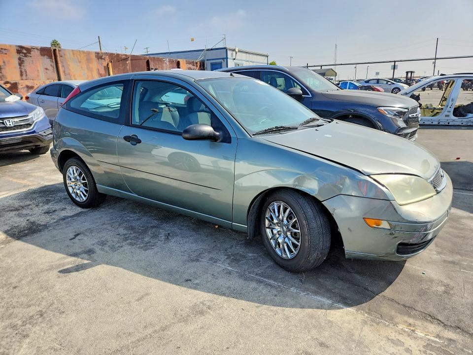 Снимка 4 от търг – 2005 FORD FOCUS с VIN 3FAFP31N65R116723