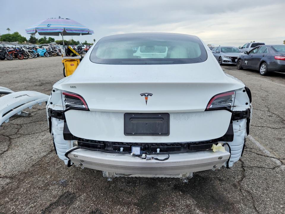 Photo 6 from auction – 2022 TESLA MODEL 3 with VIN 5YJ3E1EAXNF134223