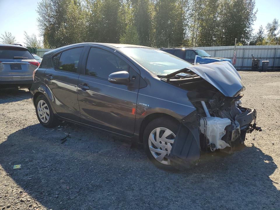 Photo 4 from auction – 2015 TOYOTA PRIUS C with VIN JTDKDTB32F1587018