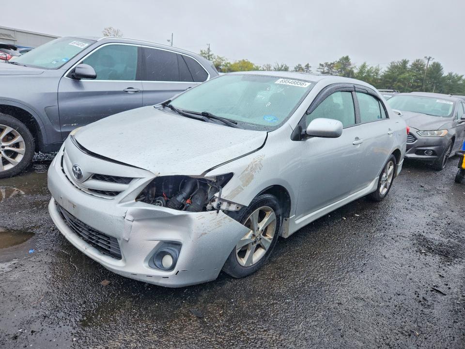 TOYOTA COROLLA 2011 with VIN 2T1BU4EE8BC566330 - Photo from auction
