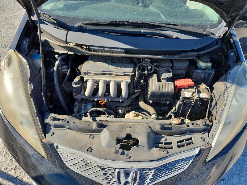 Photo 11 from auction – 2009 HONDA FIT with VIN JHMGE88259S057623