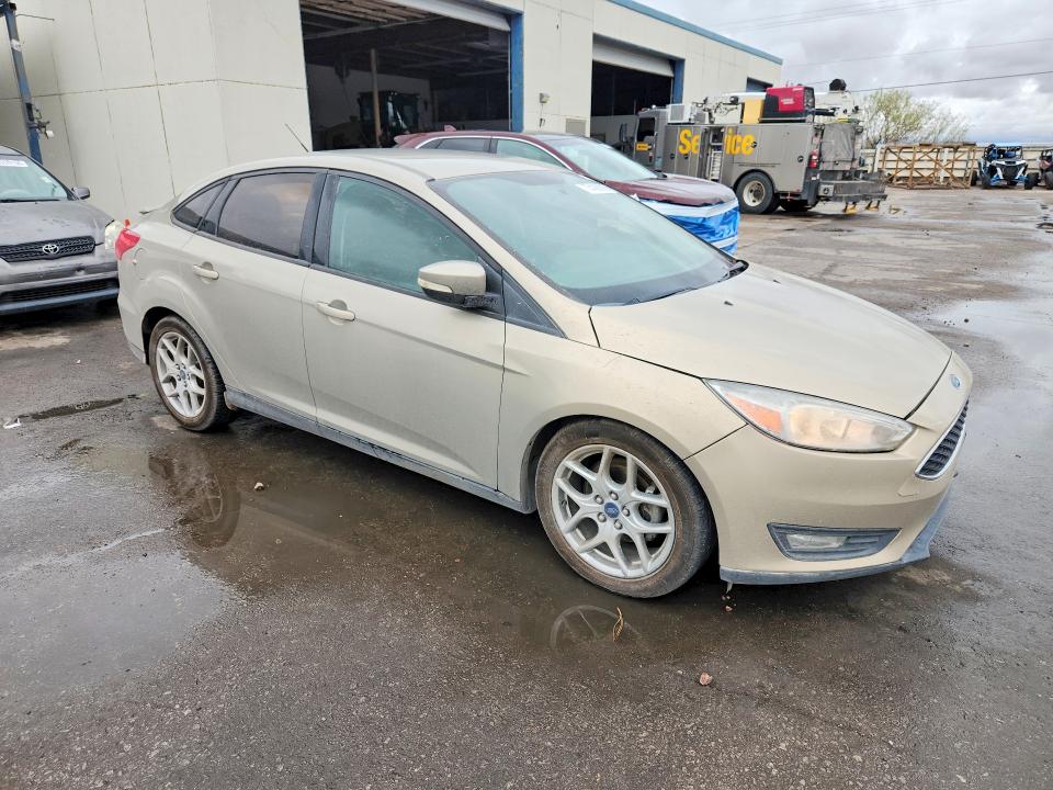 Foto 4 de la subasta – 2015 FORD FOCUS con VIN 1FADP3F25FL287212