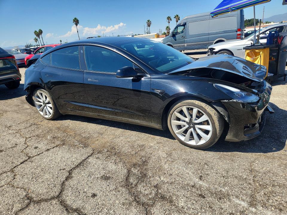 Снимка 4 от търг – 2022 TESLA MODEL 3 с VIN 5YJ3E1EB7NF164014