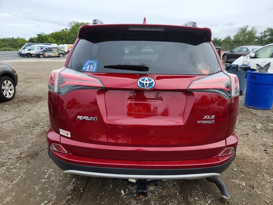 Снимка 6 от търг – 2018 TOYOTA RAV4 HYBRID с VIN JTMRJREV3JD173874