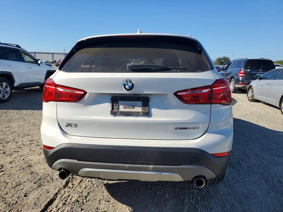 Photo 6 from auction – 2018 BMW X1 with VIN WBXHU7C34J3H43479