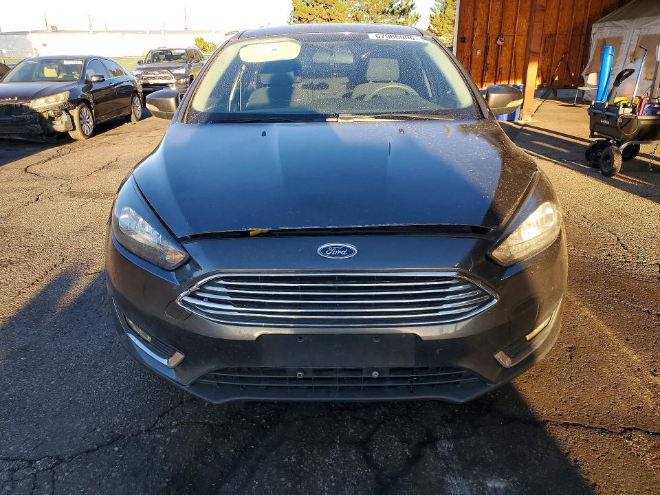 Photo 5 from auction – 2016 FORD FOCUS with VIN 1FADP3F28GL386933
