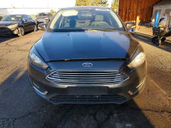Фото 5 с аукциона – 2016 FORD FOCUS с VIN 1FADP3F28GL386933