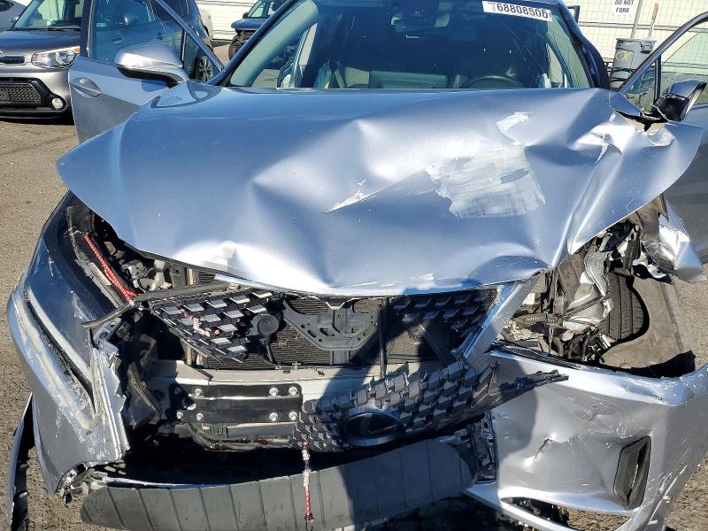 Photo 12 from auction – 2022 LEXUS RX with VIN JTJHZKFA5N2042094