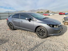 Foto 4 de la subasta – 2012 HONDA CIVIC con VIN 19XFB2F50CE089633