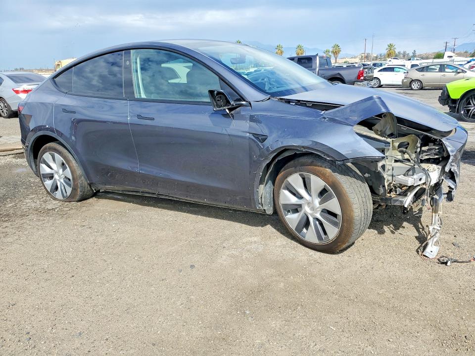 Photo 4 from auction – 2023 TESLA MODEL Y with VIN 7SAYGDED6PF960505